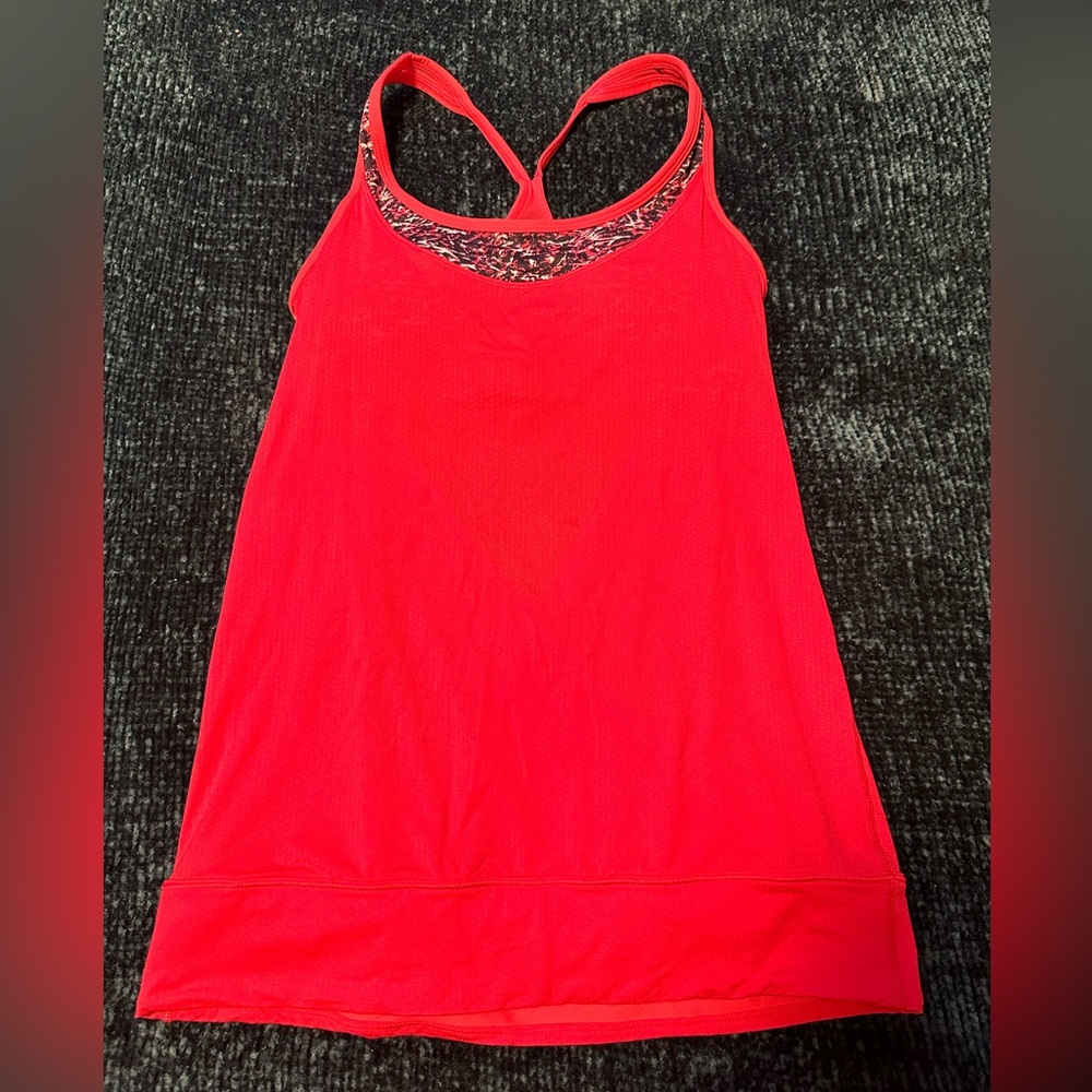 Lululemon tank size 4 , very well taken care of, like new condition.